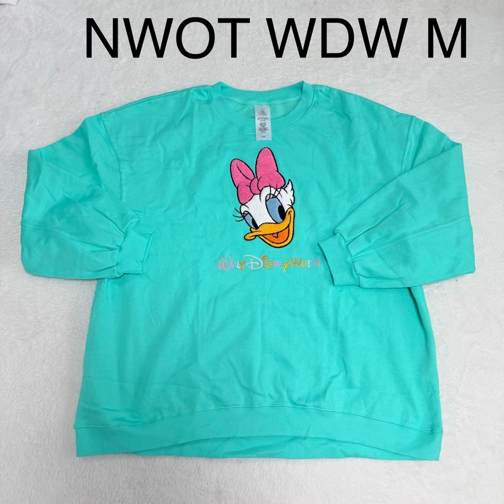 NWOT Walt Disney World  2025 Daisy Duck Pullover Adult Size M